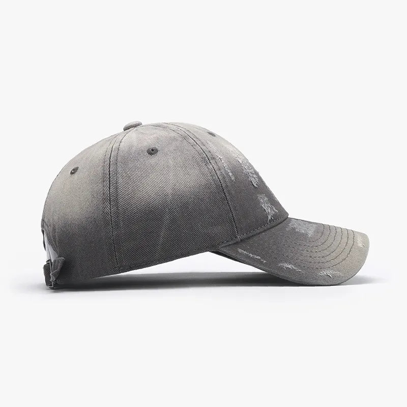 Gray distressed cotton baseball cap with frayed details