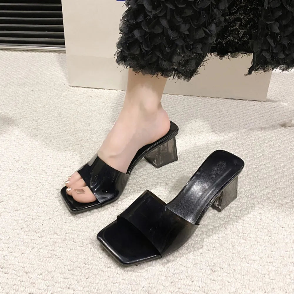 Black lucite heel square toe mules with clear block heel