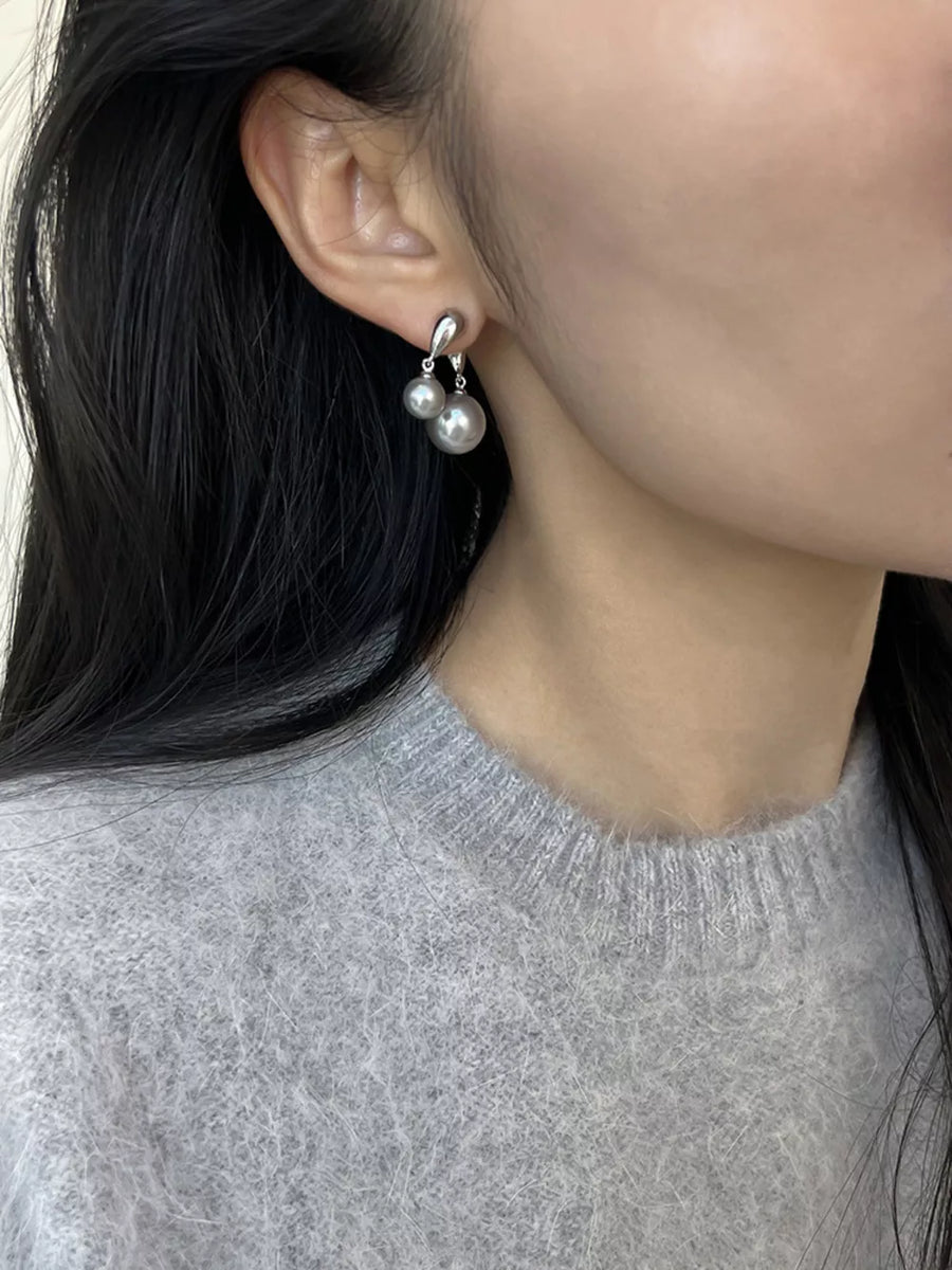 Synthetic Pearl, Alloy, 925 silver needle Care instructions: Avoid wearing durin earrings in Silver with drop silhouette