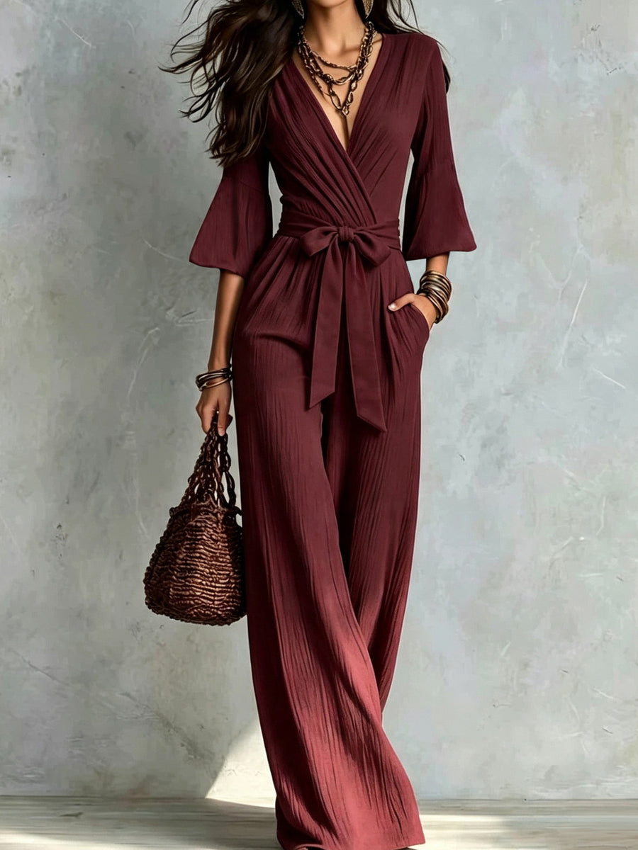 Burgundy jumpsuit with tie and pleated