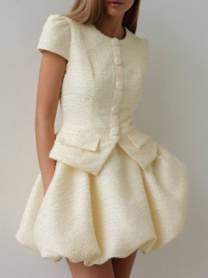 Textured cream button-down dress with short sleeves and bubble hem skirt