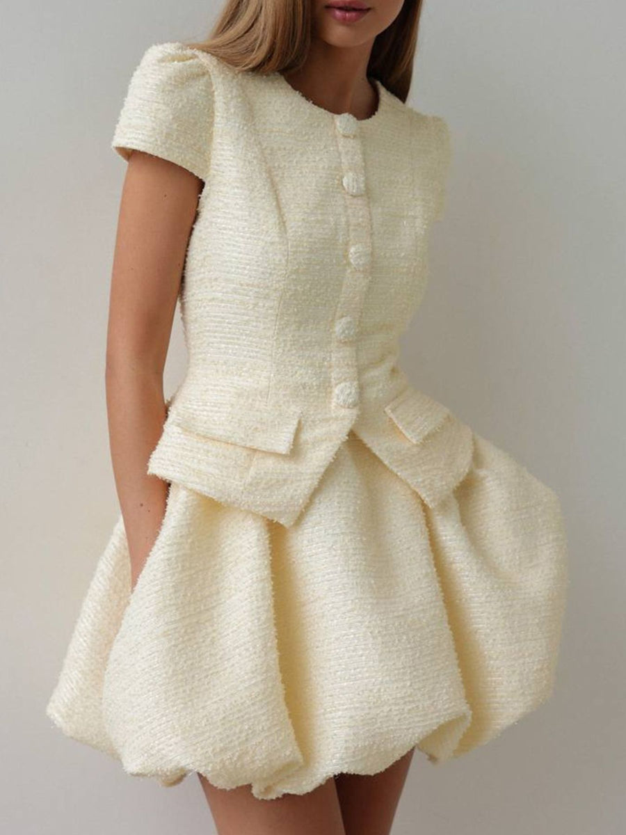 Textured cream button-down dress with short sleeves and bubble hem skirt