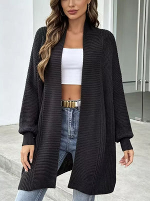 100% polyester Care instructions: Machine wash cold cardigan in Ivory with relaxed silhouette