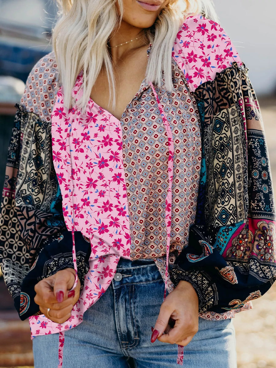 Boho floral drop shoulder blouse in fuchsia pink with patchwork print and tie neck.