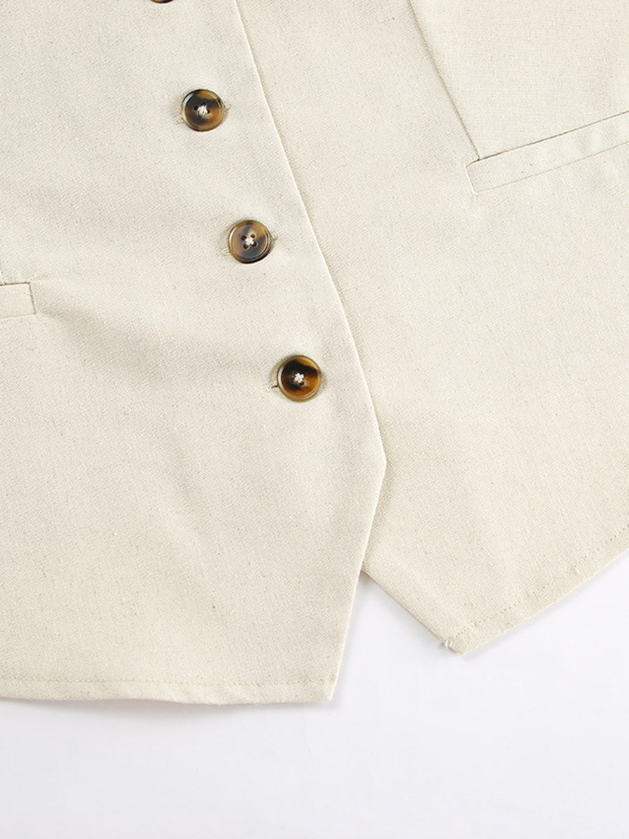 Cream cotton vest with tortoise shell buttons and pocket detail