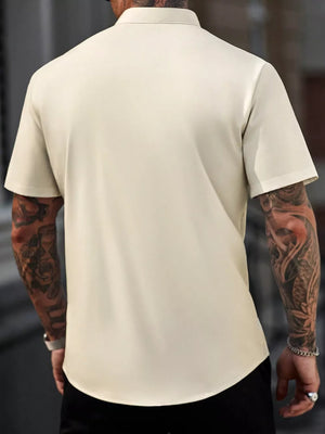 95%cotton, 5%spandex Care instructions: Machine wash cold button-up shirt in navy blue with regular silhouette