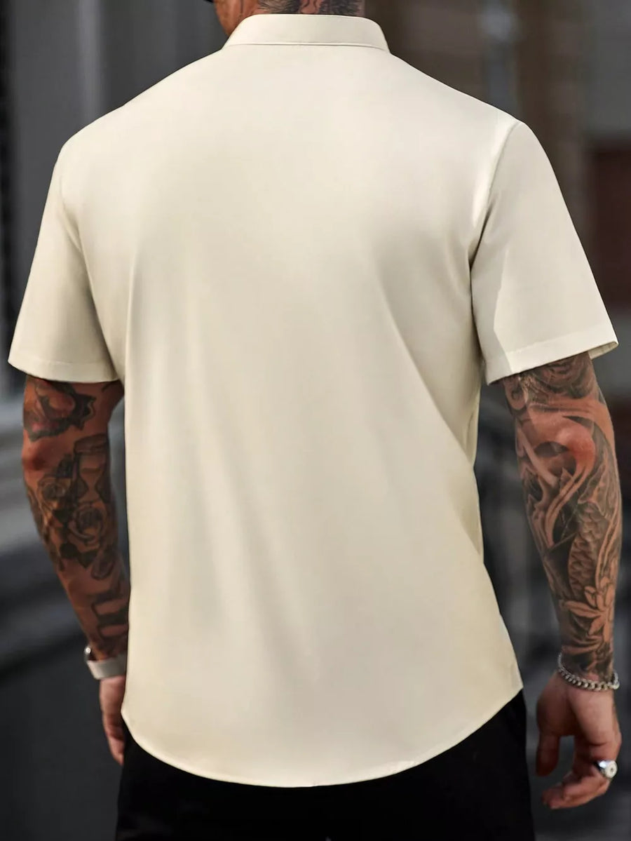 95%cotton, 5%spandex Care instructions: Machine wash cold button-up shirt in navy blue with regular silhouette
