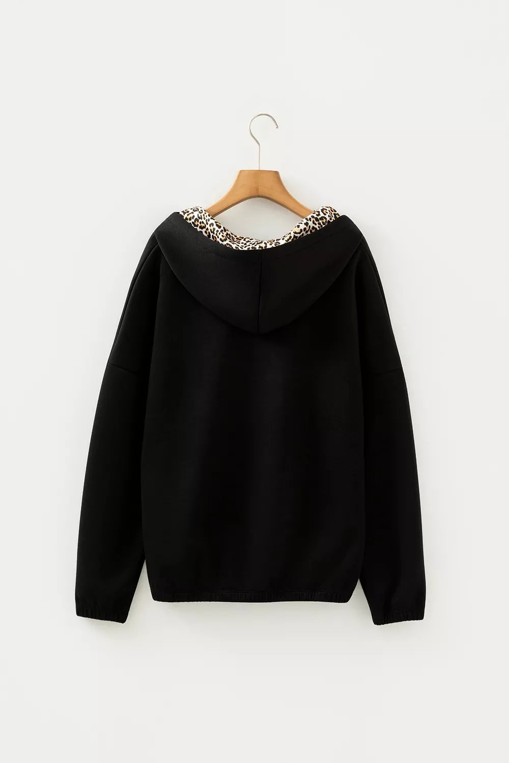 Black pullover hoodie with hip-length and pullover