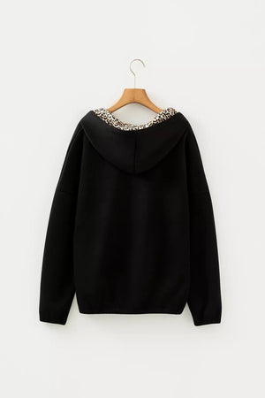 Black pullover hoodie with hip-length and pullover