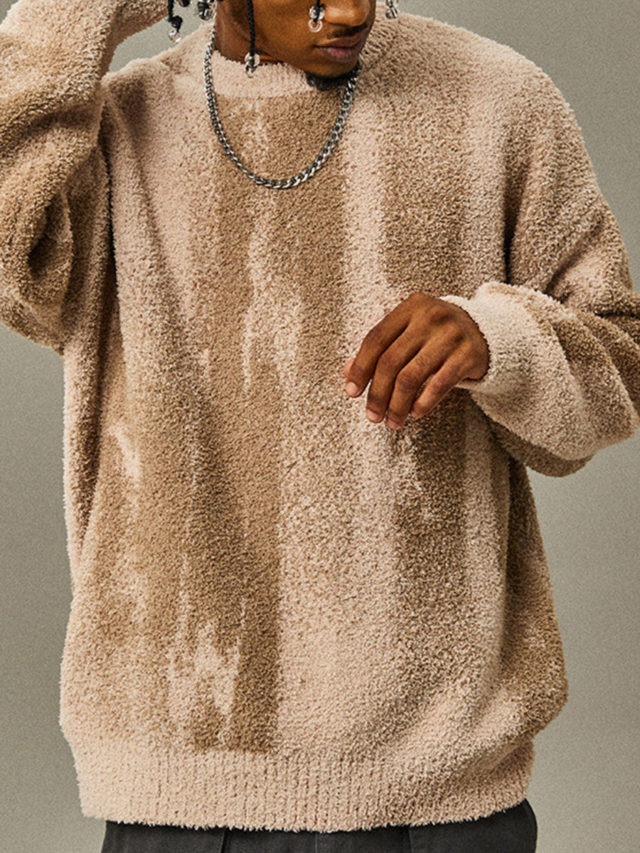 95%polyester,5%spandex Care instructions: Machine wash cold pullover sweater in Black with relaxed silhouette