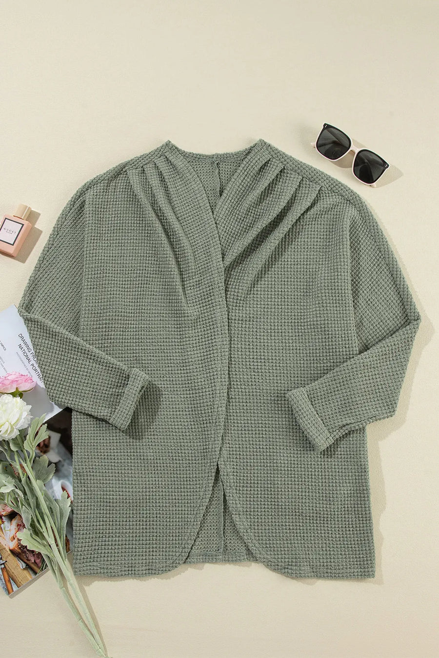 Sage waffle knit open-front duster cardigan with a draped neckline and rolled cuffs.
