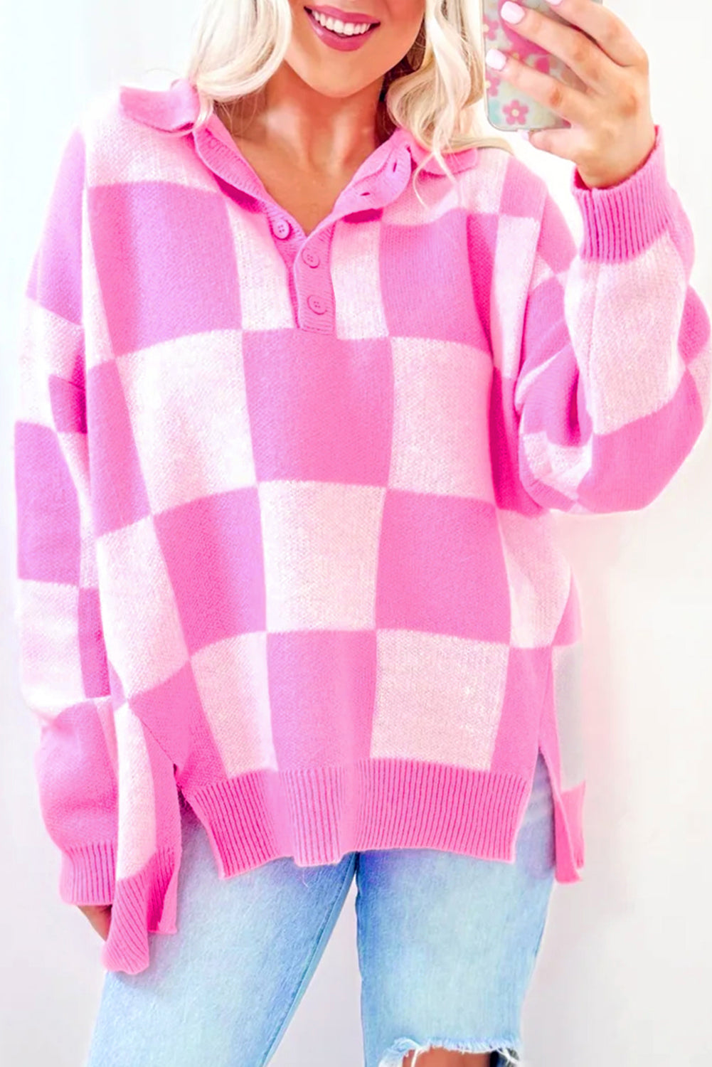 Checkered polo neck knit sweater in fuchsia pink with button detail.
