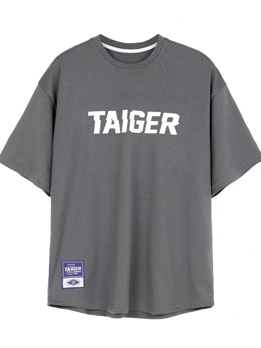 Gray mesh oversized t-shirt with white "TAIGER" graphic and a woven label.
