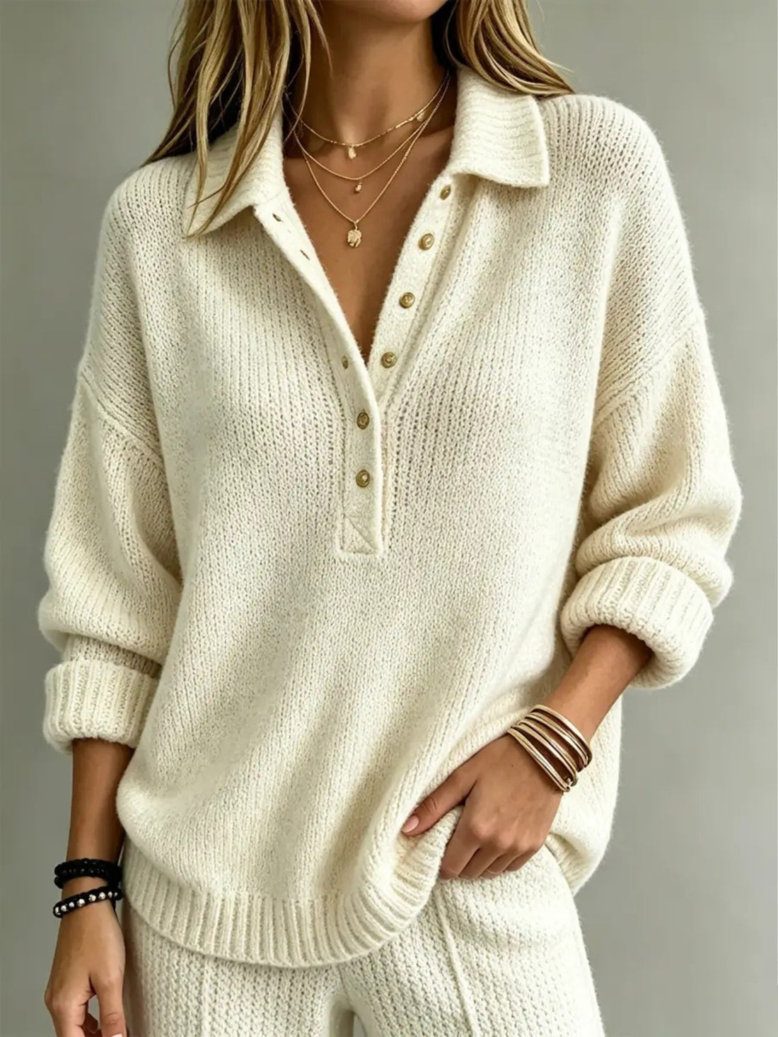 pullover sweater in ivory featuring ribbed and relaxed fit
