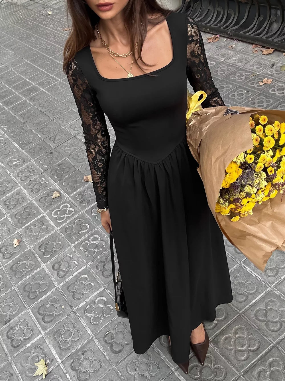 100% polyester Care instructions: Machine wash cold maxi dress in Black with A-line silhouette