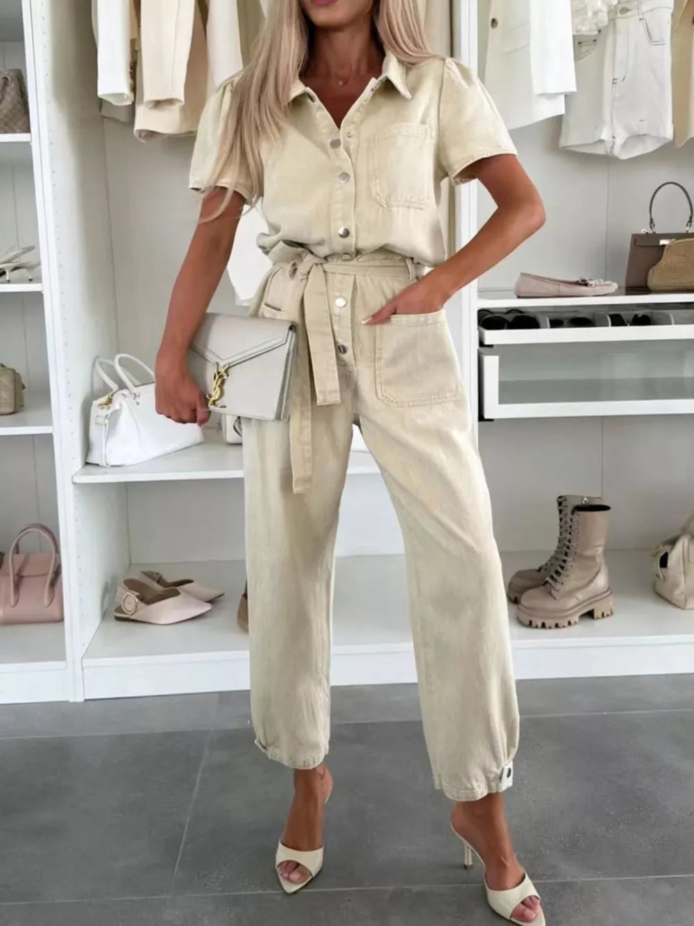 vintage-inspired jumpsuit in light wash denim with collared