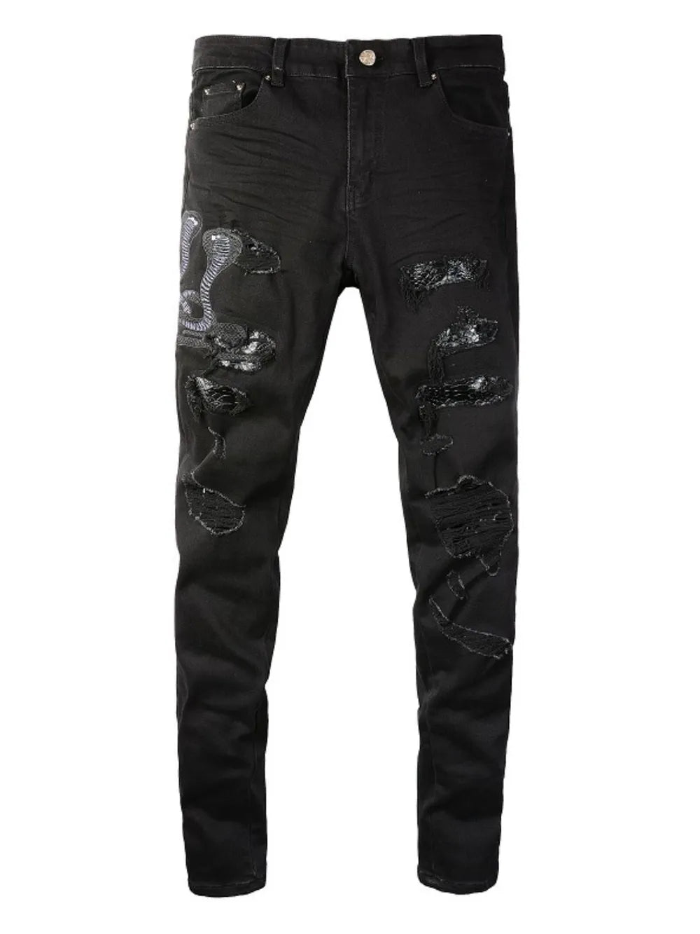 Black skinny jeans with distressed details and embroidered cobra graphic.