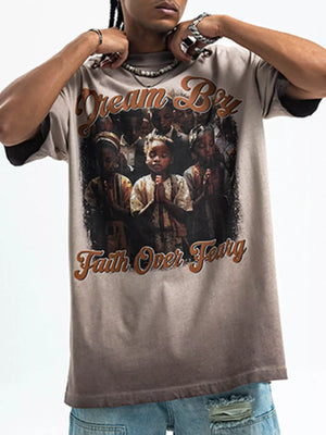 Khaki graphic t-shirt with puff sleeves featuring a "Dream Big Faith Over Fear" print of children praying.