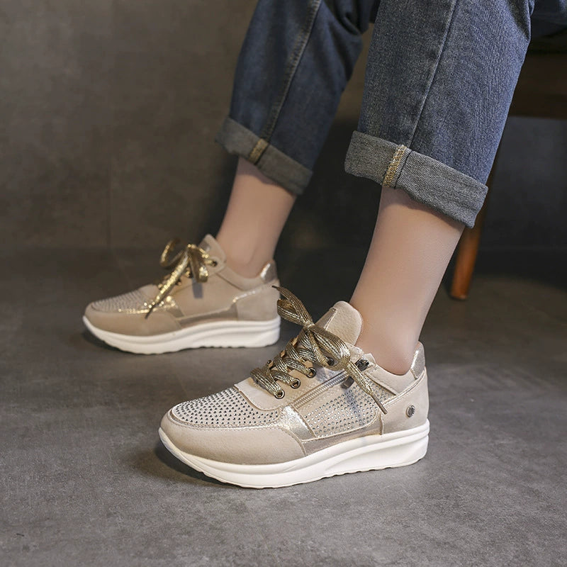 Khaki rhinestone embellished lace-up sneakers with chunky soles and gold accents.