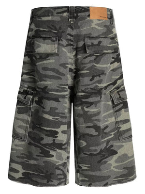 Camouflage cotton cargo capris with utility pockets and button fly.