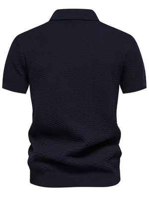 Dark Navy chevron stripe knit polo shirt with short sleeves and a zip neckline.
