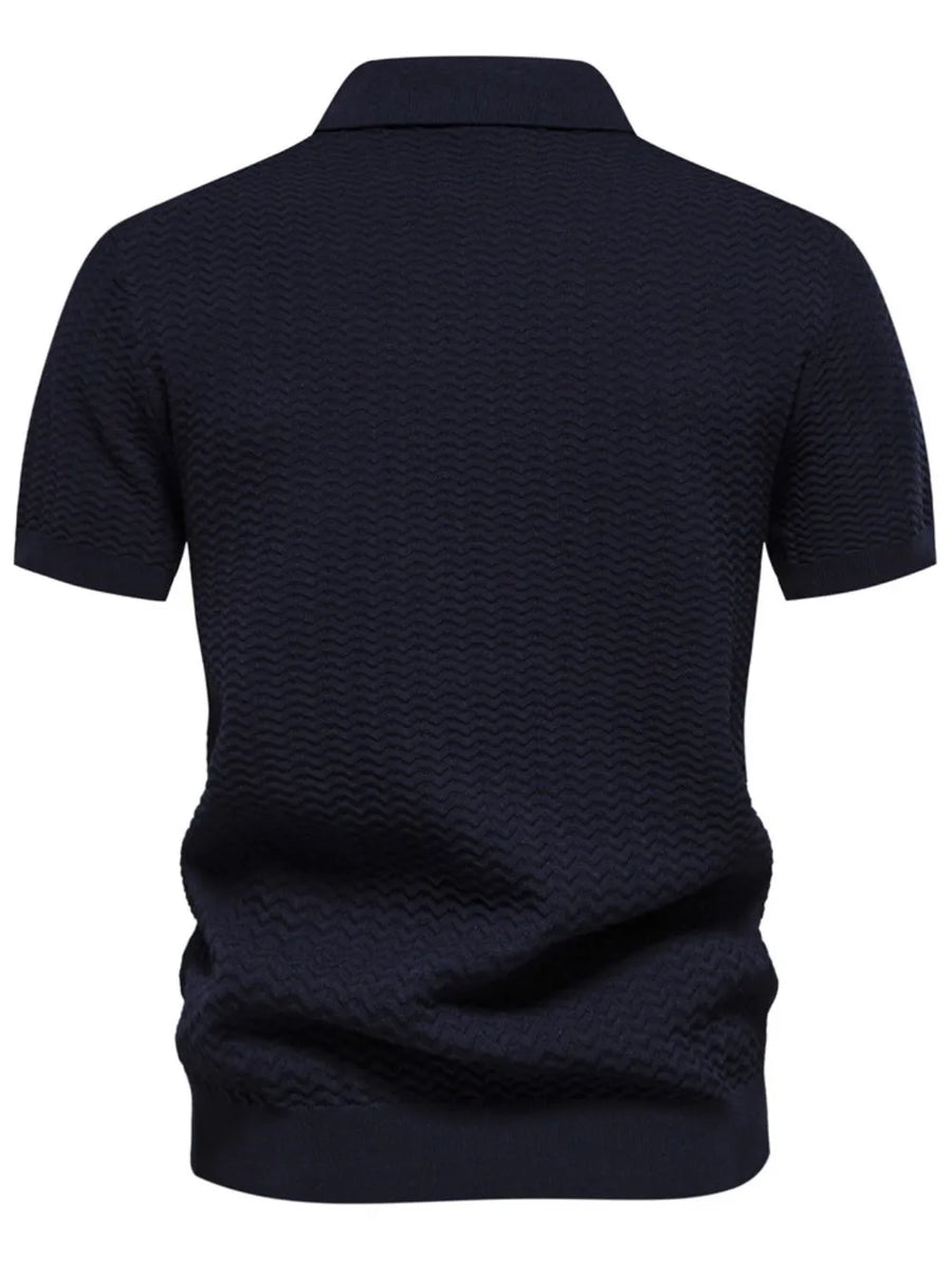 Dark Navy chevron stripe knit polo shirt with short sleeves and a zip neckline.