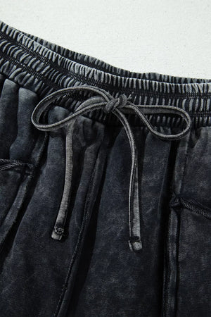 Black relaxed barrel pants with N/A