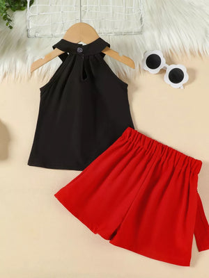 Black halter top with keyhole detail and red skort with elastic waist and bow tie detail