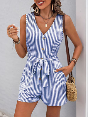 Blue and white striped romper with V-neck, button front, tie waist, and pockets.