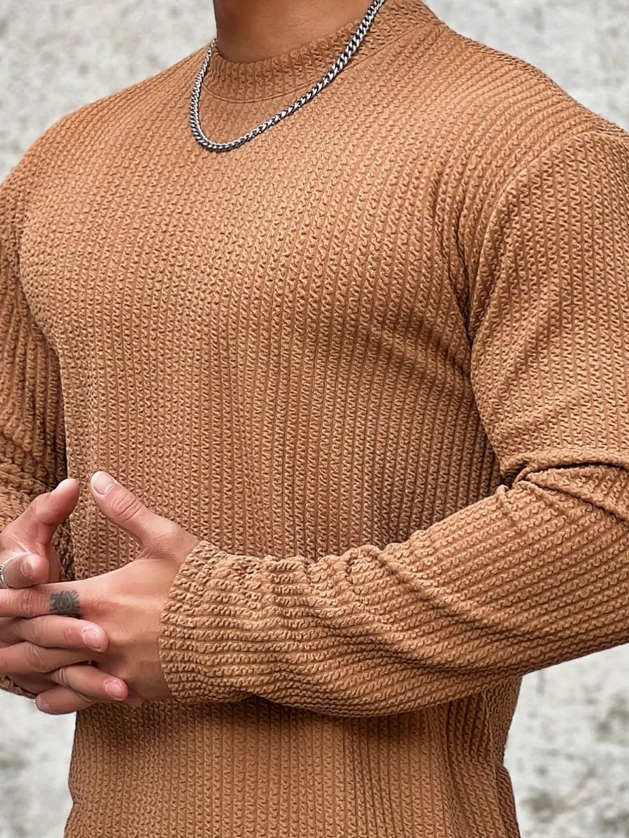Men's tan long sleeve tee with textured fabric and round neck.