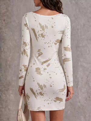 bodycon dress in gold with paint splatter and ruched