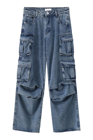 Baggy denim cargo pants in medium wash with multiple pleated pockets.
