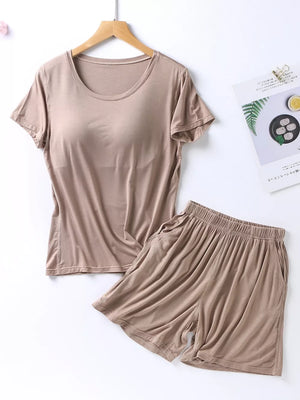 Comfortable two-piece pajama set in Milk Tea Camel with short sleeves and elastic waistband shorts with pockets.