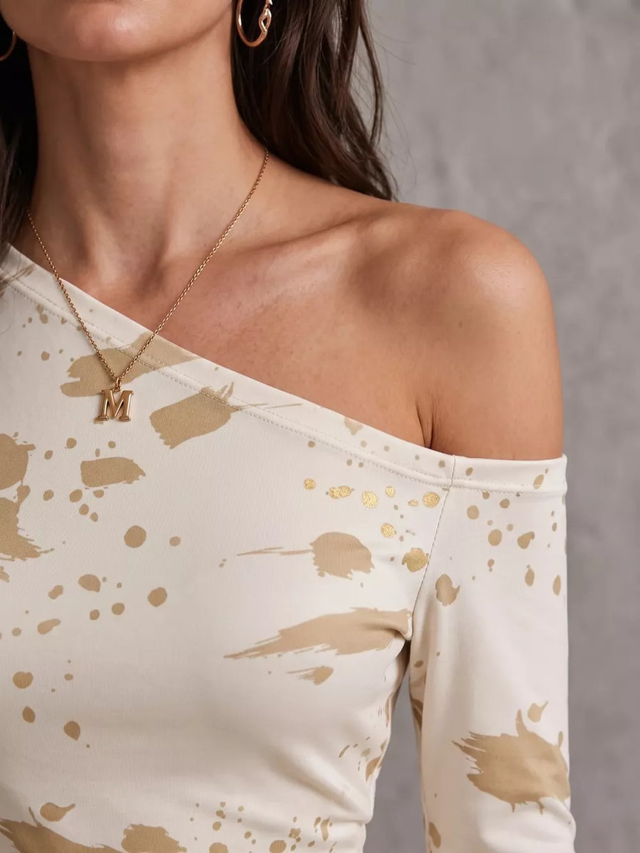 edgy bodycon dress in gold with one-shoulder