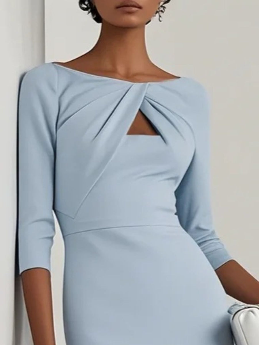 Light blue midi dress with twist-front detail and cutout neckline.