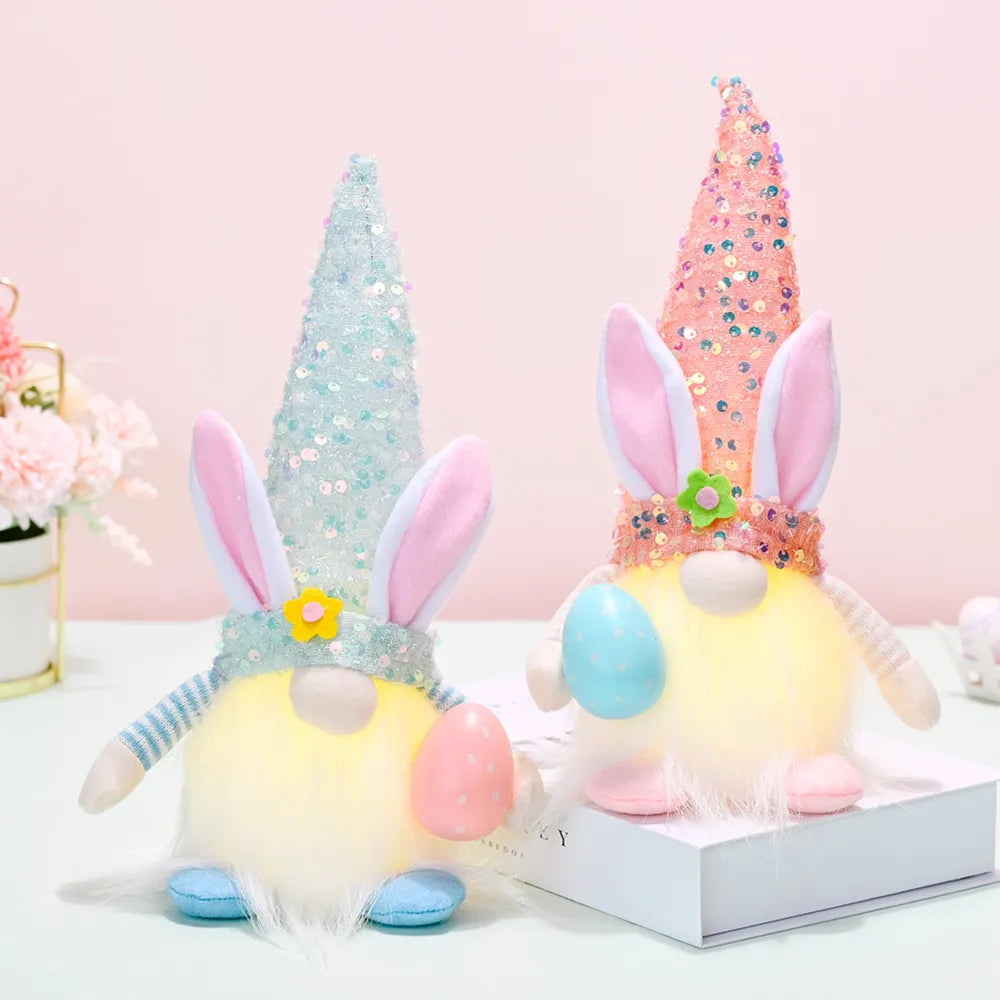Easter bunny gnome with sequin cone hat and bunny ears, holding an egg.