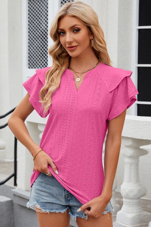 Hot Pink eyelet blouse with flutter sleeves and a V-neckline.