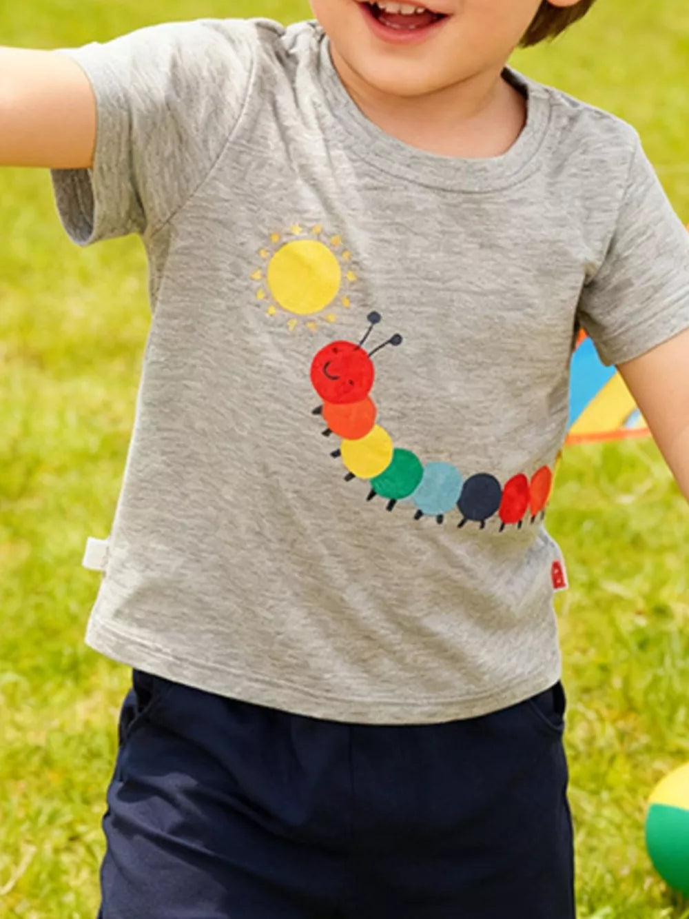Toddler t-shirt with colorful caterpillar graphic and "Adventure Awaits" text.