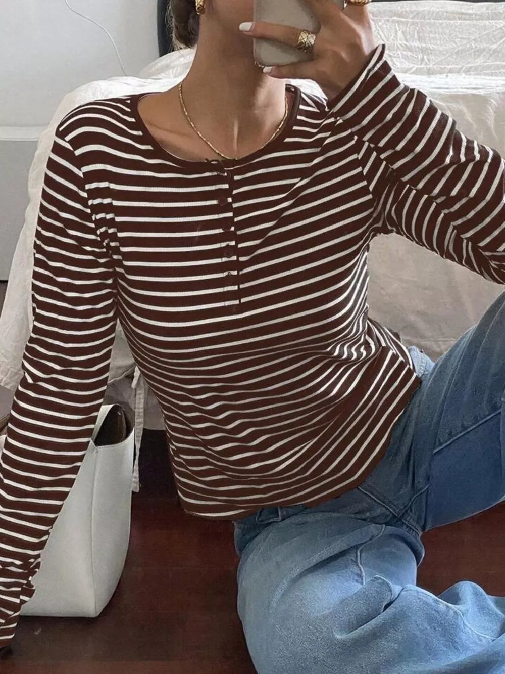 henley in black with striped and buttoned