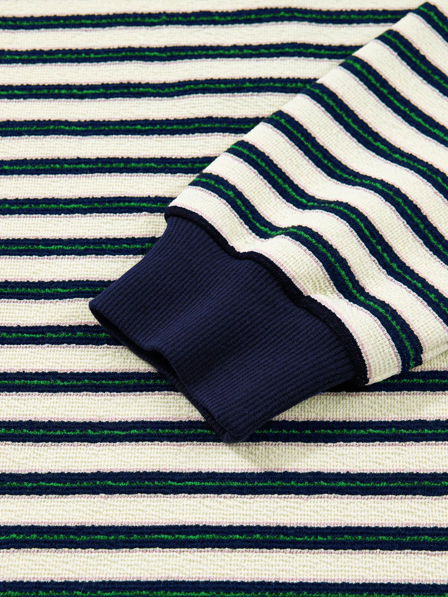 Striped top in navy with contrast collar detail and ribbed cuffs.