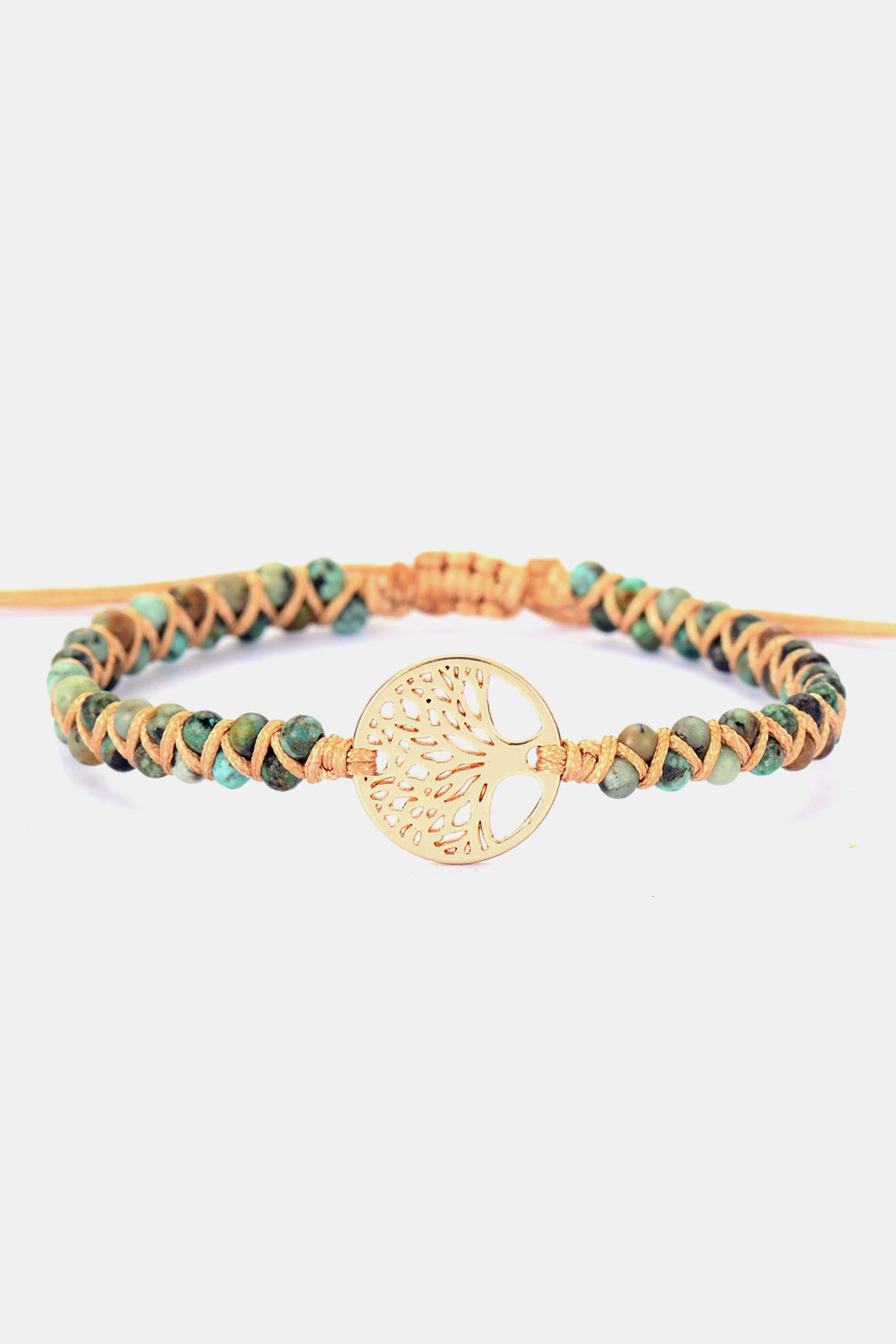 Gold Tree of Life macrame bracelet with turquoise beads and adjustable cord.