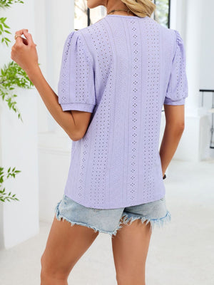 Purple eyelet t-shirt with short puff sleeves and V-neckline.