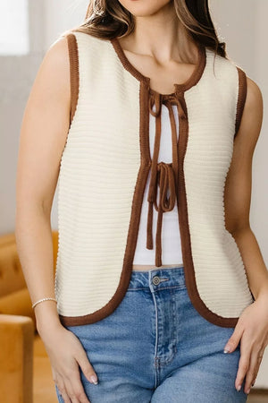 ivory sweater vest with waist-length and tie