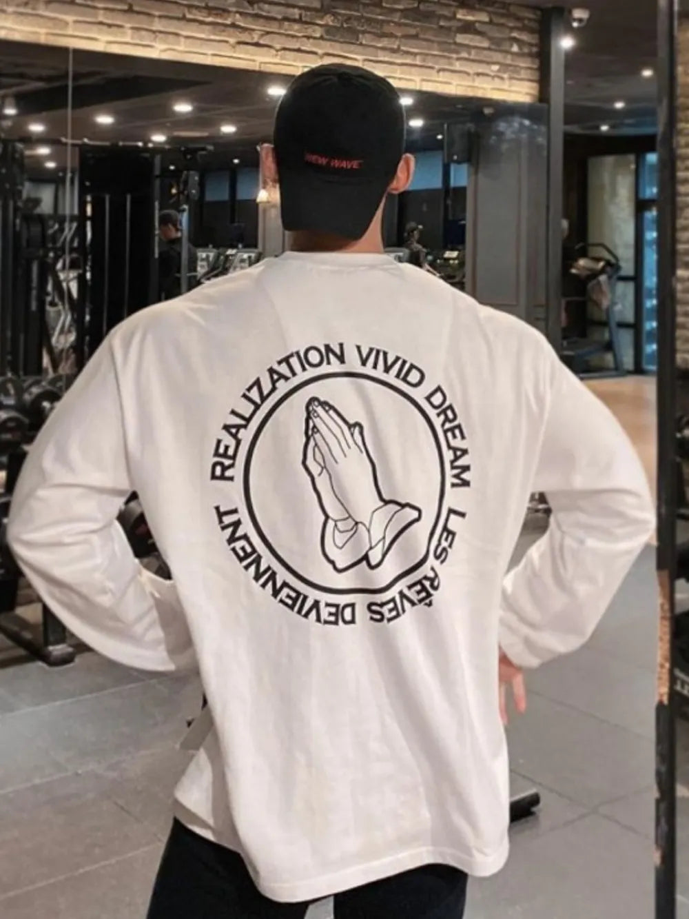 White long sleeve t-shirt with praying hands graphic and text on back
