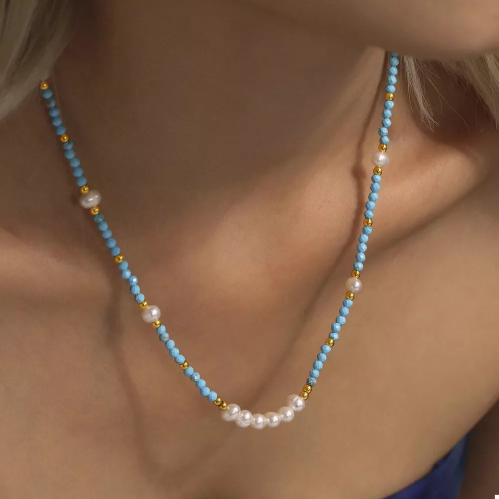 necklace in turquoise featuring beaded and fitted fit