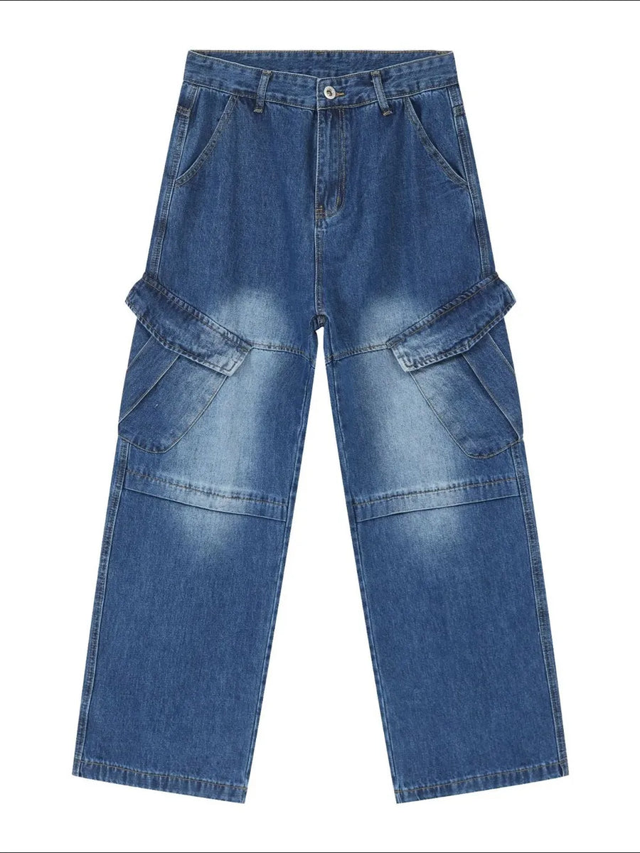Cargo denim flare trousers in medium wash with dual flap pockets and a relaxed fit.