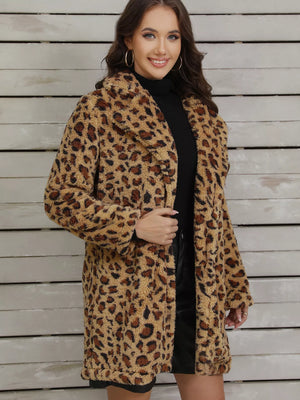 Cozy fuzzy teddy wrap coat in leopard print with a shawl collar.