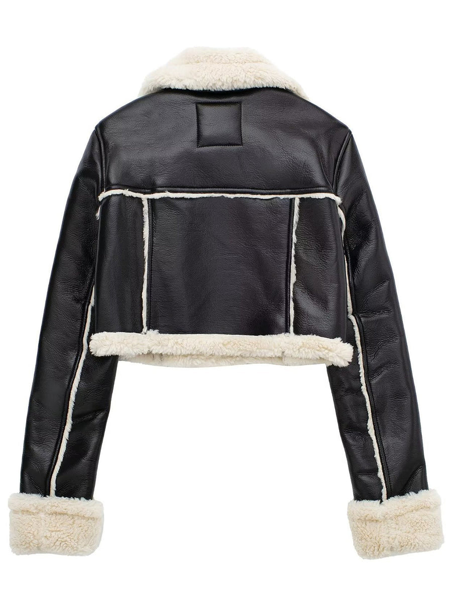 Black cropped aviator jacket with white shearling trim and collar.