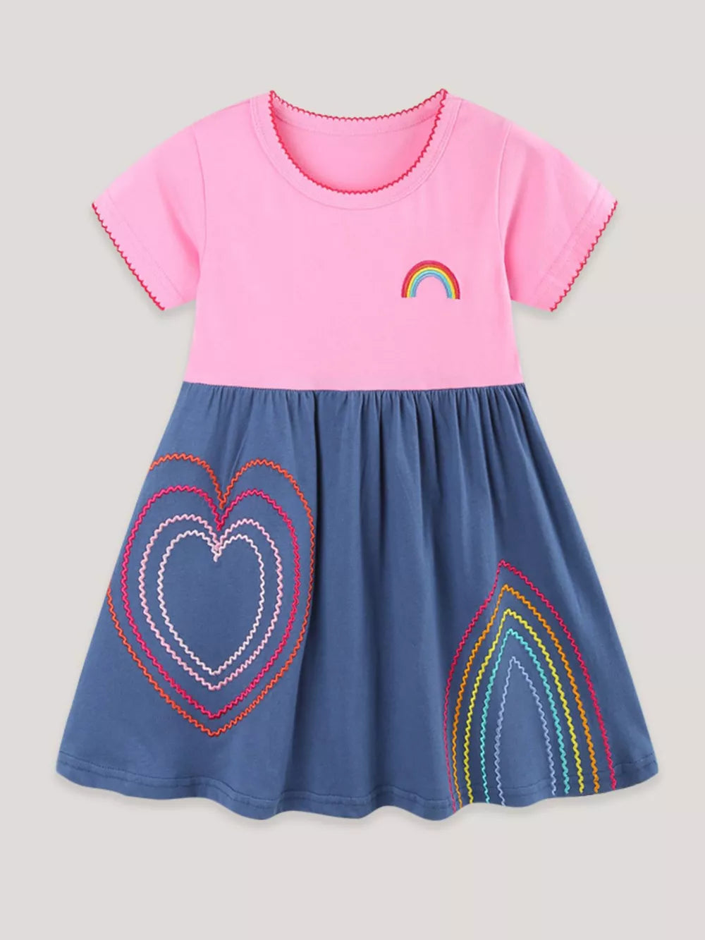 Toddler dress with pink top, blue skirt, embroidered hearts and rainbows.