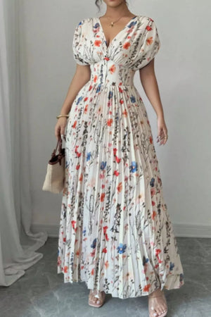 Maxi dress with floral print, V-neck, flutter sleeves, and pleated skirt.
